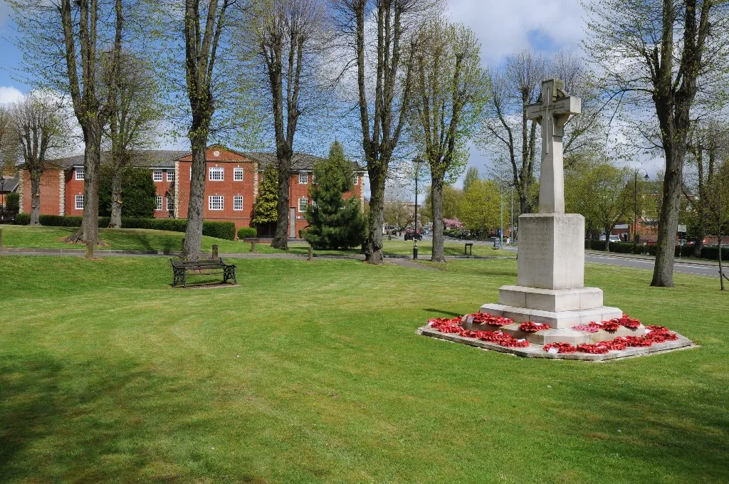 Bromsgrove's war memorial on Crown Close, a Portland stone wheel cross unveiled in 2013, where the town's Remembrance Sunday service is held